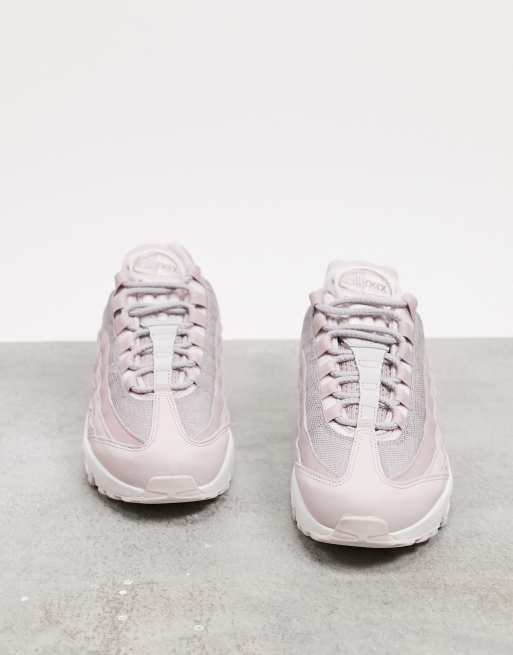 Nike Air Max 95 trainers with soft pink