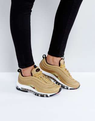 gold nike 97s