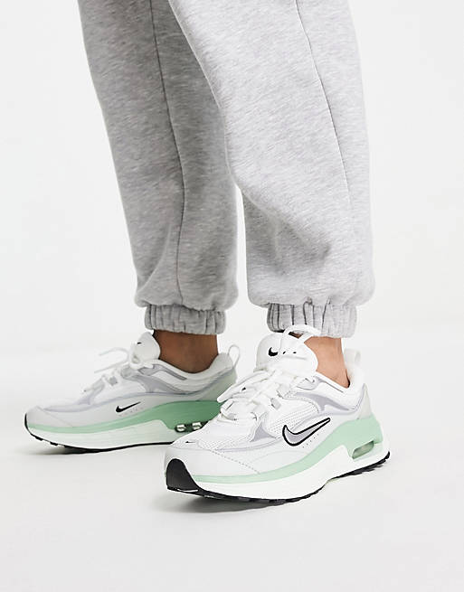 Nike sneakers in white and silver ASOS