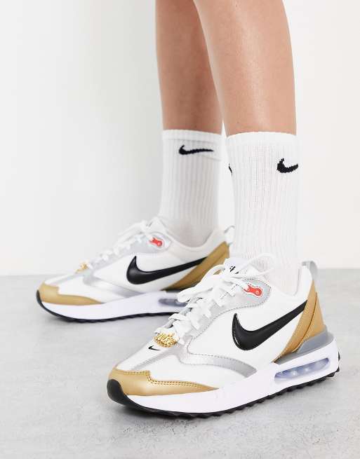 Nike gold shop and silver shoes