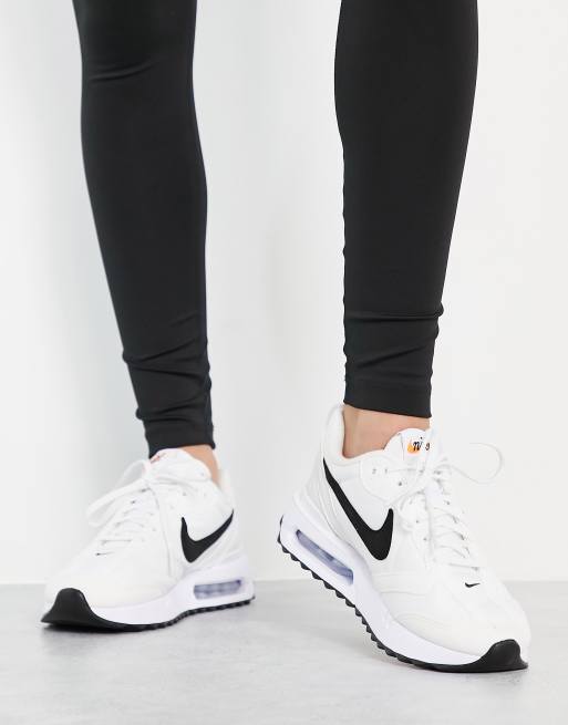 Black and white sales nikes for men