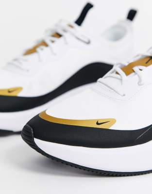 nike air nere e oro