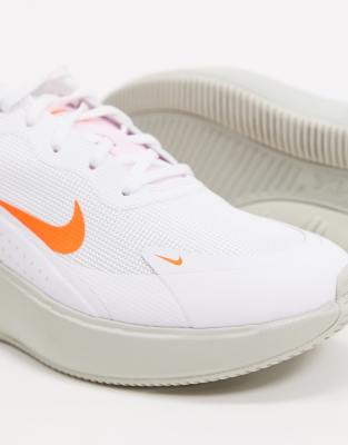pink white and orange nike shoes
