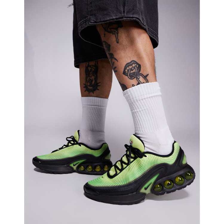 Nike Air Max DN sneakers in black and green | ASOS
