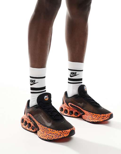 Nike Air Max DN sneakers in black and orange