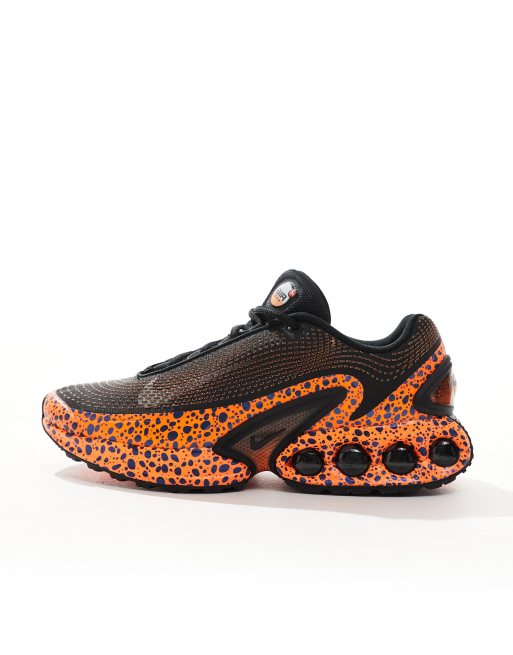 Nike Air Max DN sneakers in black and orange