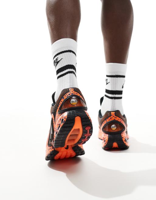 Nike Air Max DN sneakers in black and orange