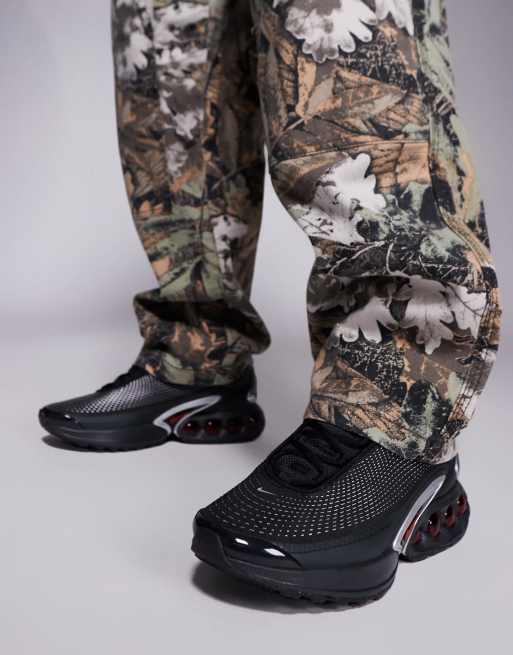Nike Air Max DN sneakers in black and red