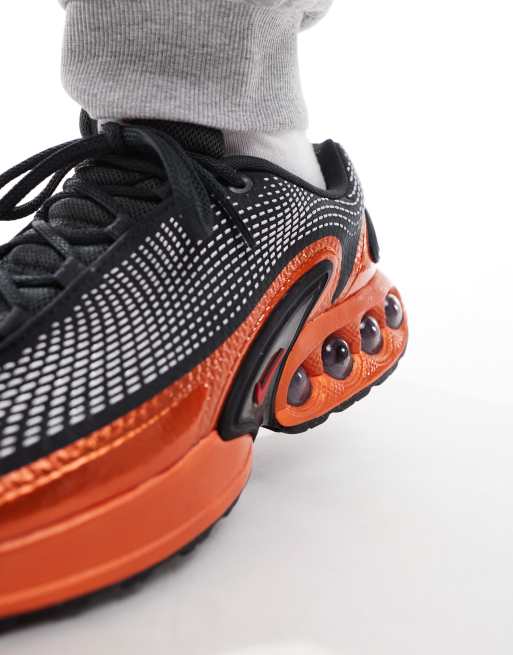 Nike Air Max DN sneakers in dark gray and red