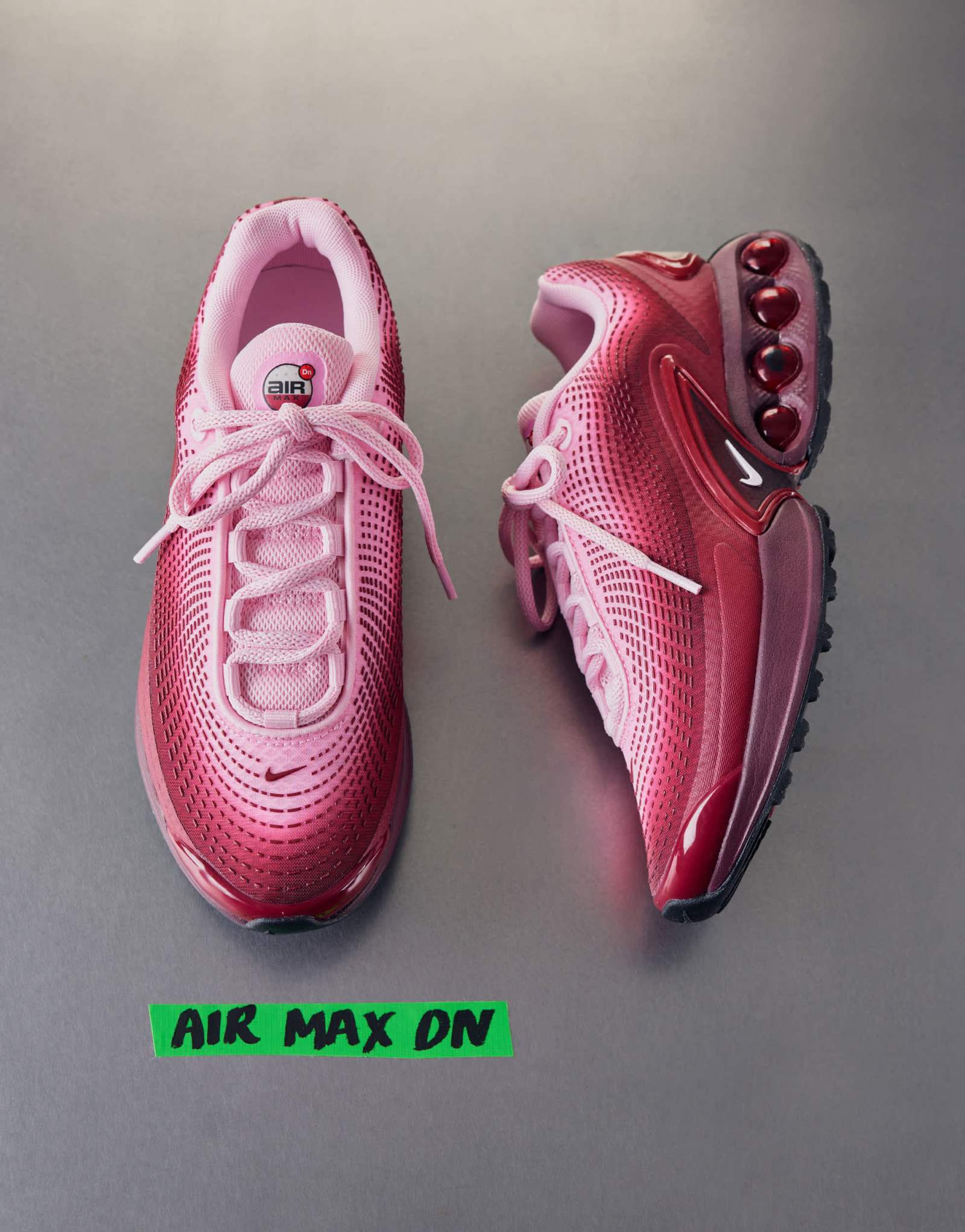 Кроссовки Nike Air Max DN розового и бордового цветов