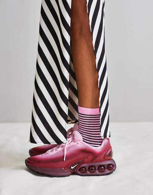 Nike Air Max DN sneakers in pink and burgundy ASOS