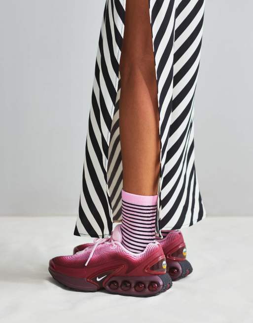Nike Air Max DN sneakers in pink and burgundy