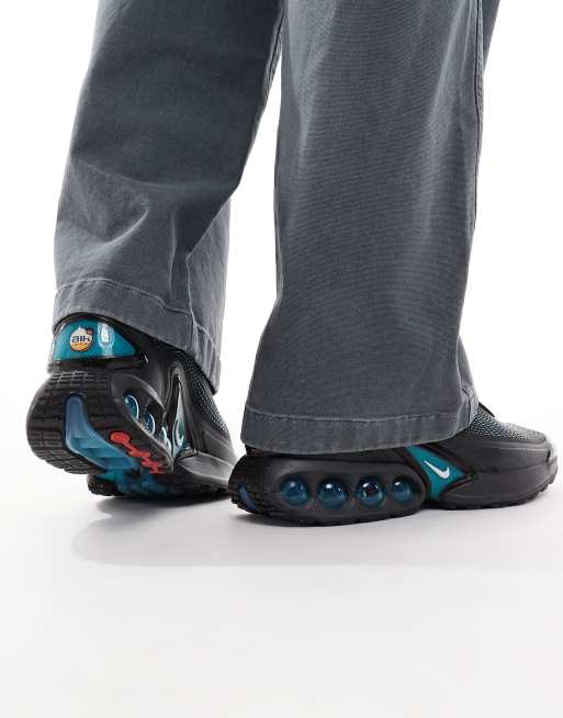 Nike Air Max DN trainers in black and blue, 4 of 5
