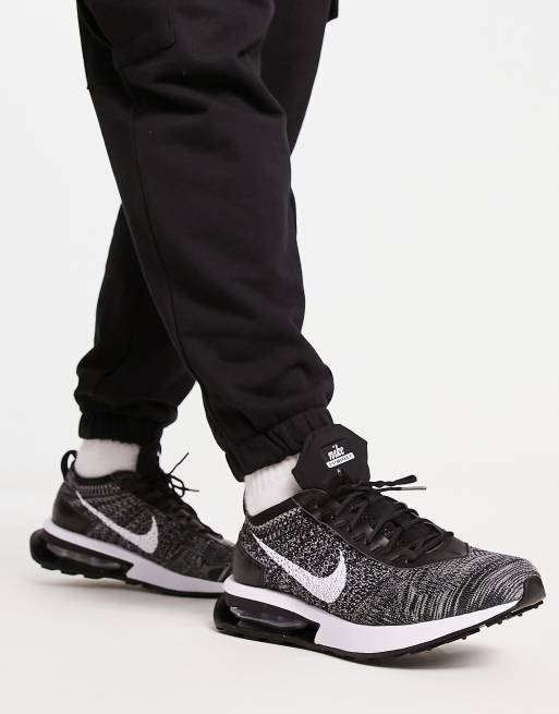 Nike Air Max fly knit racer trainers in black and white