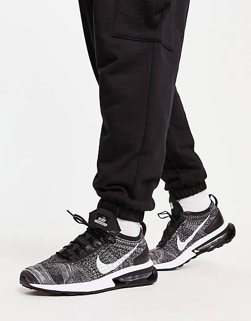 Nike Max Flyknit Racer sneakers in black and white | ASOS