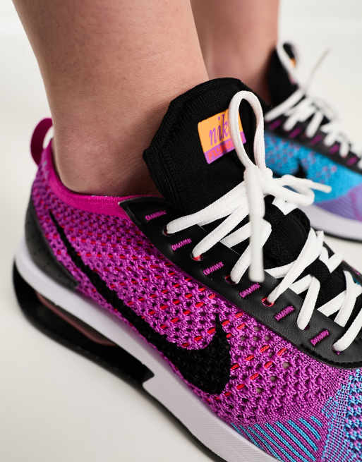 Air Flyknit Racer in fuchsia/black | ASOS