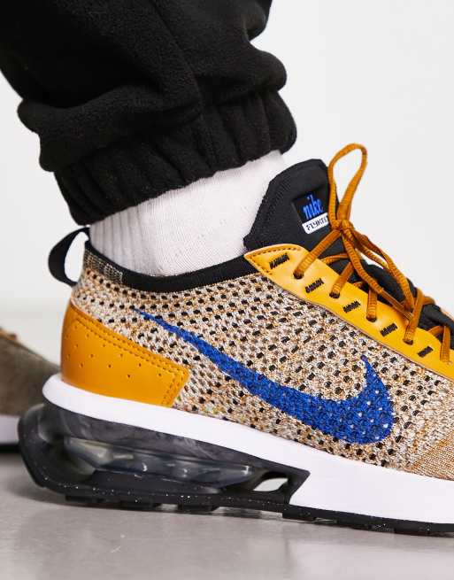 Nike blue hotsell and gold sneakers