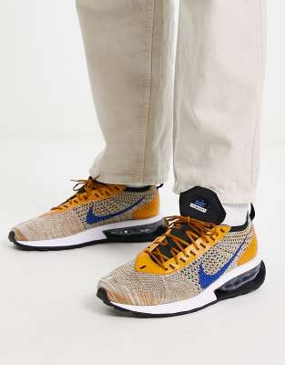 Nike Air Max Flyknit Racer trainers in gold and hyper royal - ASOS Price Checker