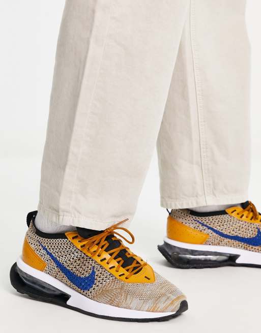 Nike Air Max Flyknit Racer trainers in gold and hyper royal ASOS