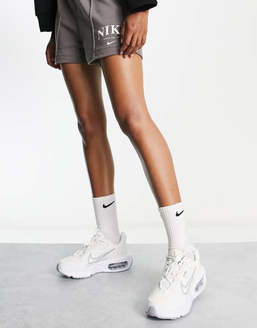 Nike Air Max Interlock sneakers in summit white | ASOS