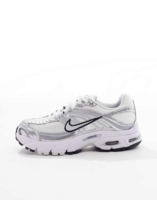 Nike Air Max Moto 2K sneakers in white and black