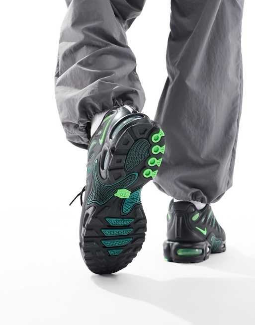 Nike Air Max Plus Drift sneakers in black and green | ASOS