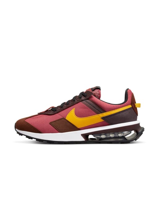 Nike yellow and red on sale shoes