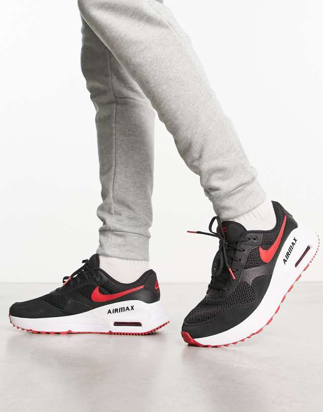 Nike Air Max SYSTM sneakers in black and red