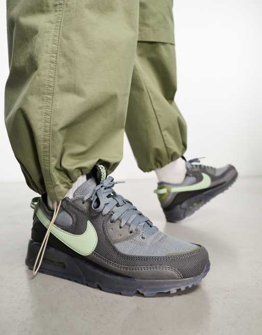 Grey and 2025 green nike trainers