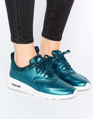 teal nike trainers