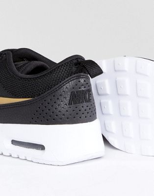 black & gold air max thea trainers
