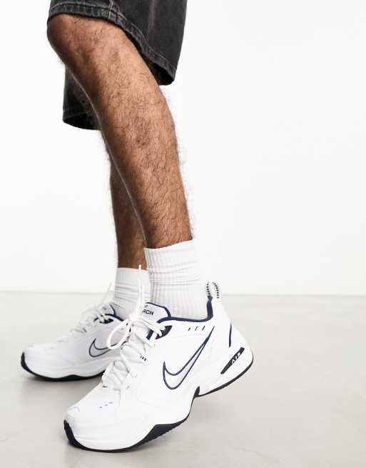 Nike Air Monarch IV sneakers in white and black