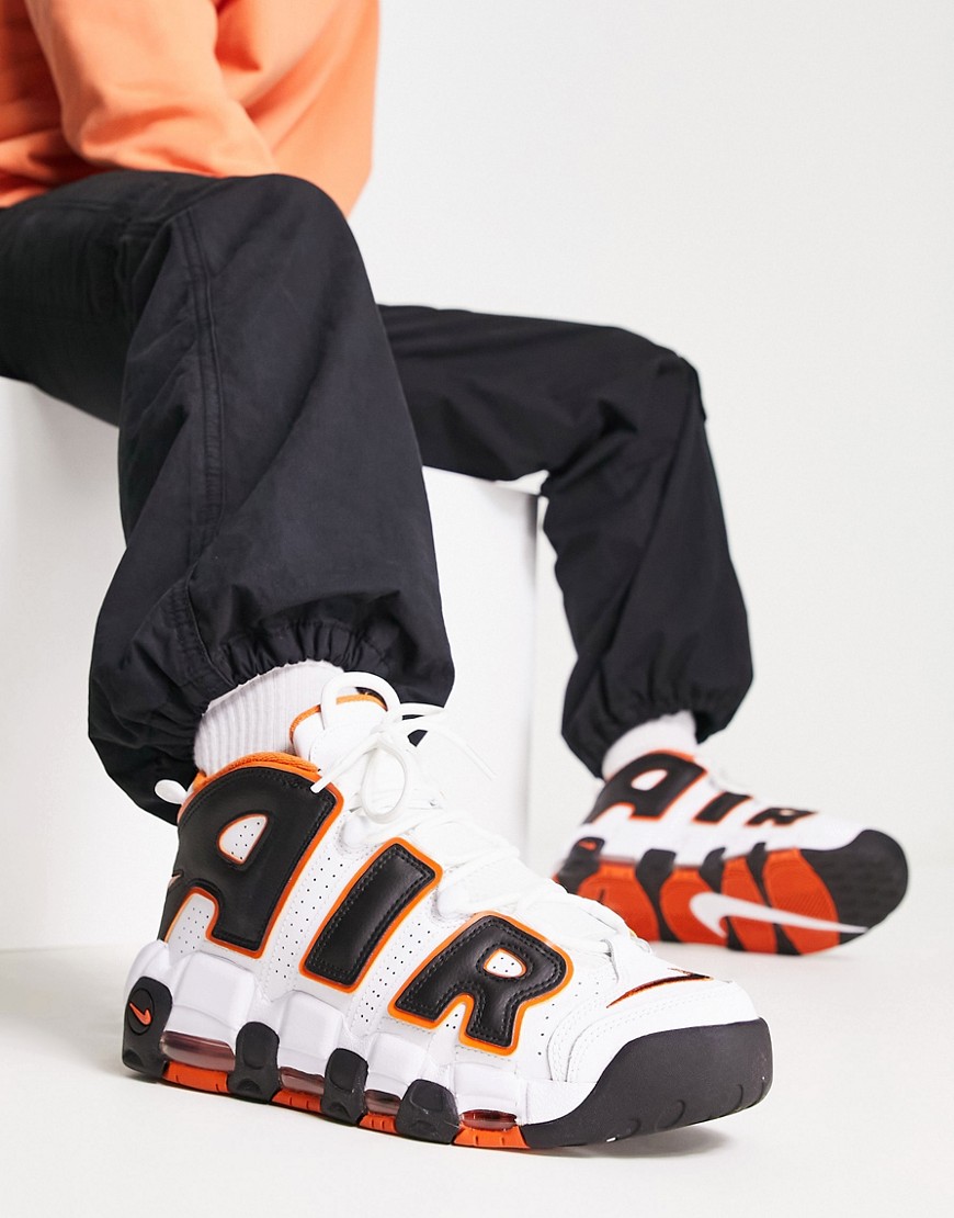 Nike Air More Uptempo trainers in white and orange