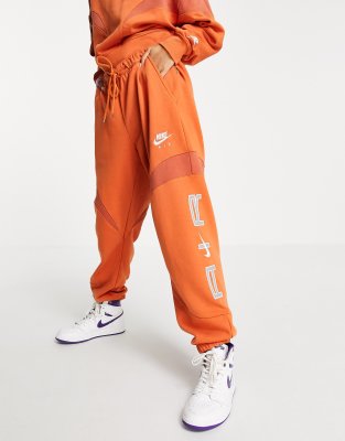 nike orange sweat suit