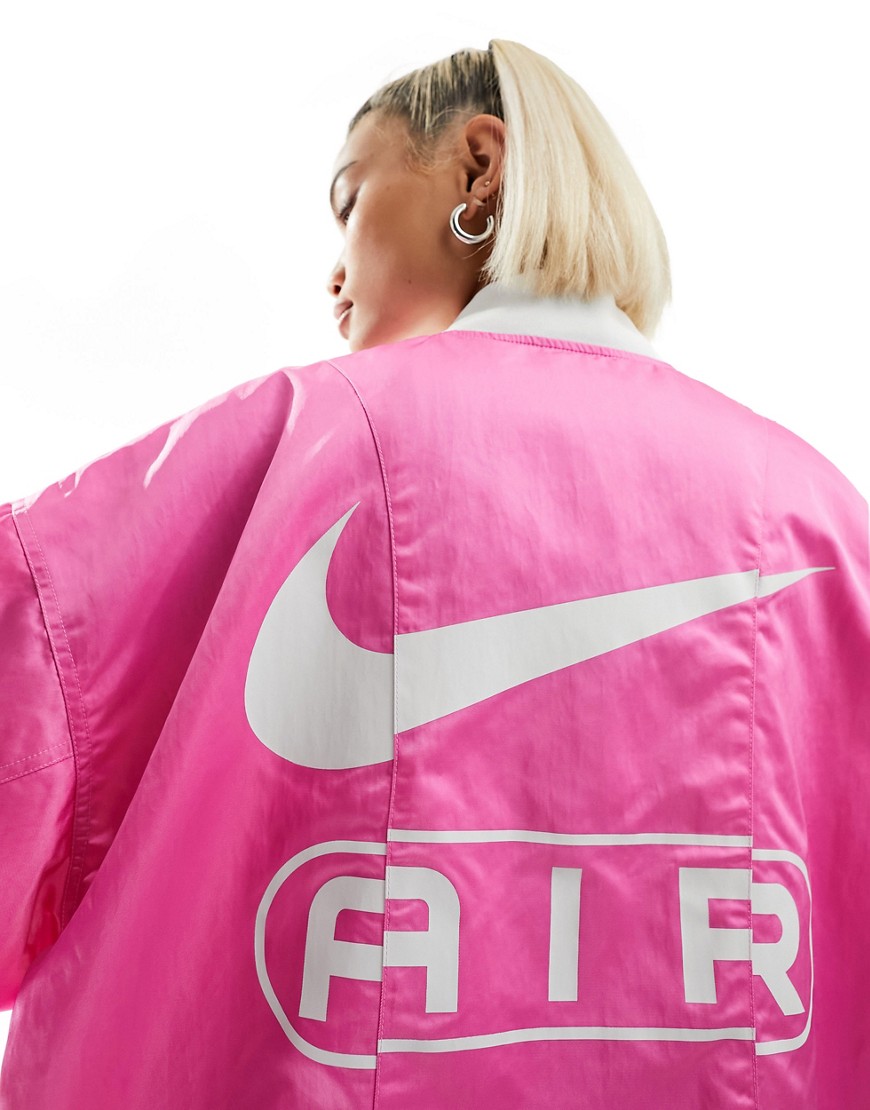 Nike Air oversized woven bomber jacket in pink
