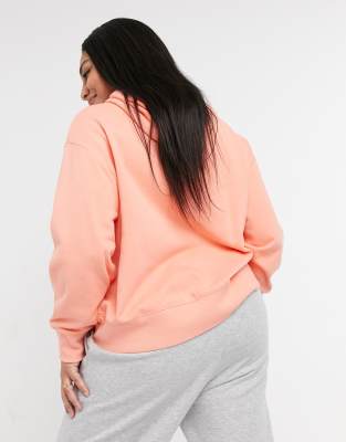 peach nike sweater