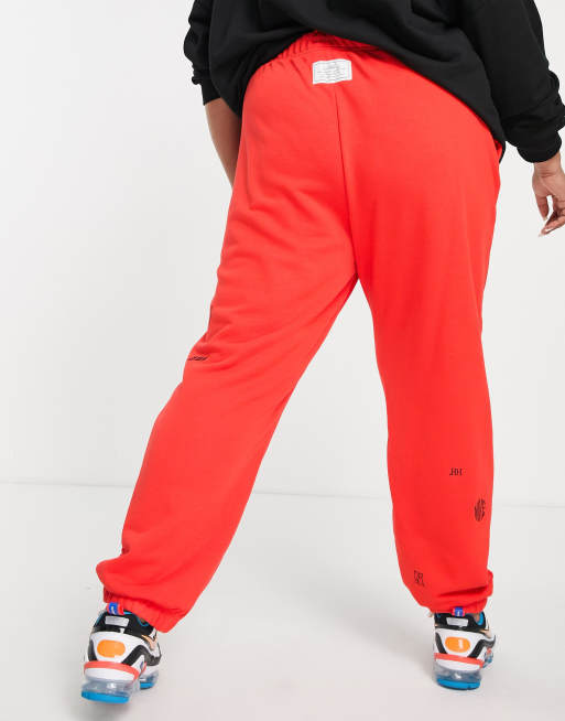 Nike Air Plus joggers in red ASOS