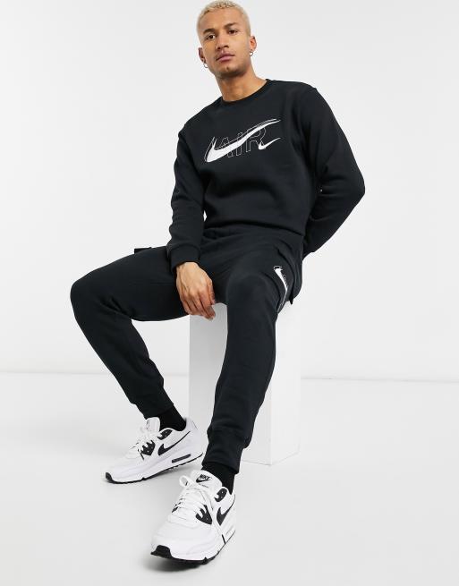 Nike air cuffed joggers in black sale