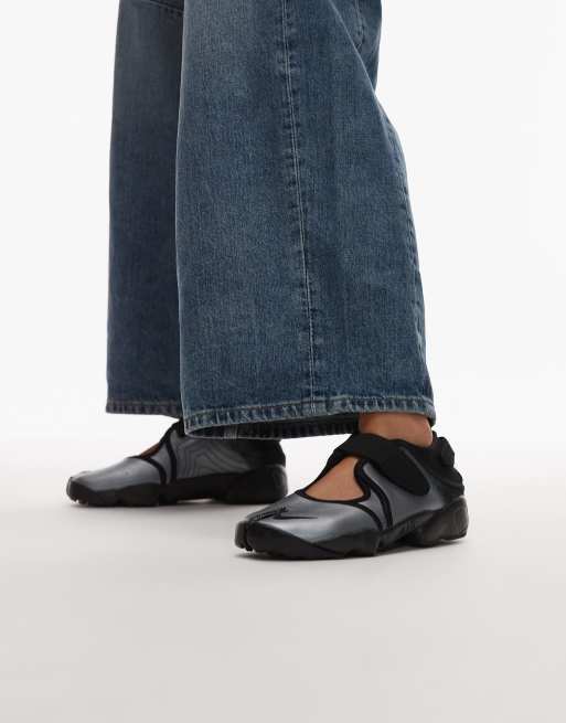 Nike Air Rift sneakers in black and silver