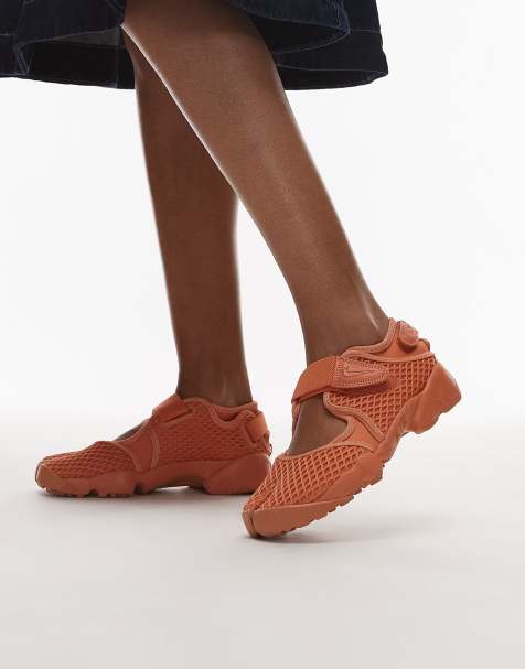 Nike Air Rift sneakers in orange - view 1