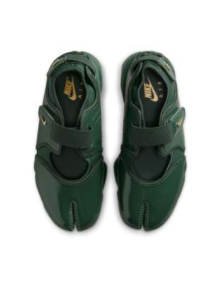 Nike Air Rift sneakers in patent green with gold detailing