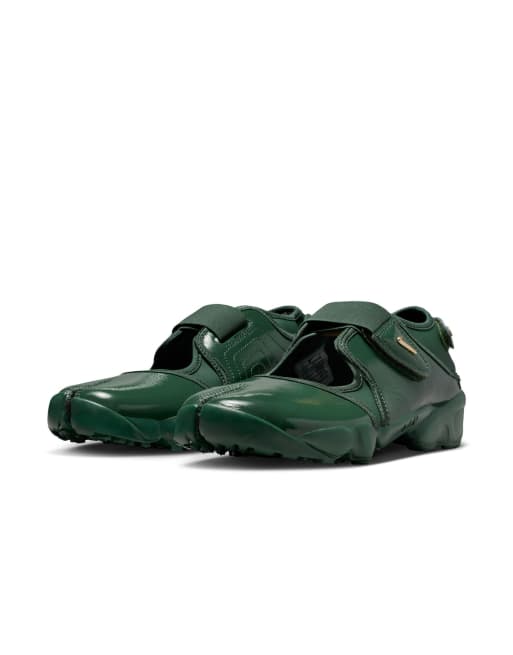 Nike Air Rift sneakers in patent green with gold detailing