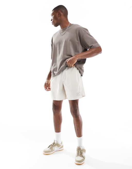 Nike Air Run shorts in beige ASOS