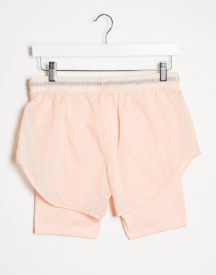 nike air running 2 in 1 short in pink