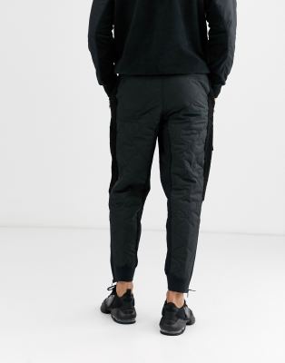 nike air sherpa utility cuffed joggers in black