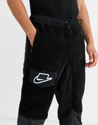 nike air sherpa utility cuffed joggers in black