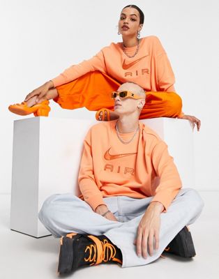 Nike Air Unisex oversized logo crew sweatshirt in orange trance