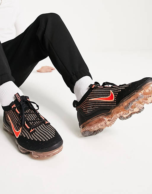 aanplakbiljet wereld sneeuwman Nike - Air Vapormax 2021 Flyknit - Sneakers in zwart en oranje | ASOS