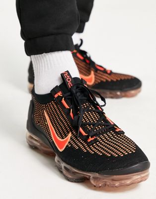 Nike Air Vapormax 2021 flyknit trainers in black and orange