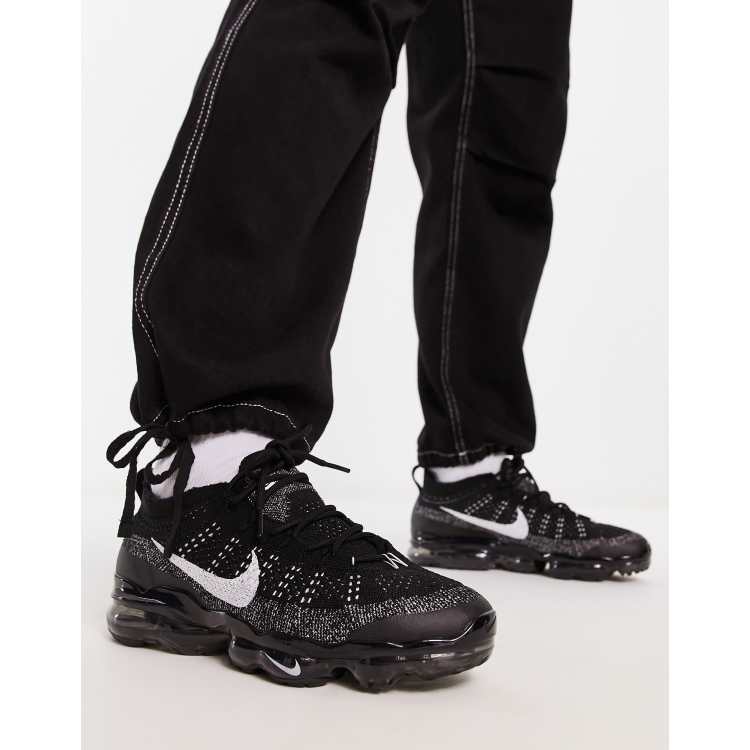 Nike Air 2023 flyknit sneakers in black & white | ASOS